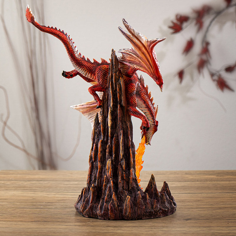 Fury Fire Dragon Sculpture Breathing Fire Over Volcanic Rock Base