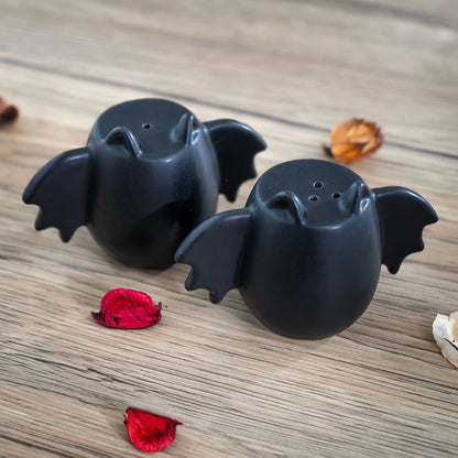 Bat Wing Ceramic Salt and Pepper Shakers Halloween Decorative Tabletop Accent with Fun Bat Design Perfect for Adding Flavor and Style to Your Kitchen or Dining Room 2.36" Inches