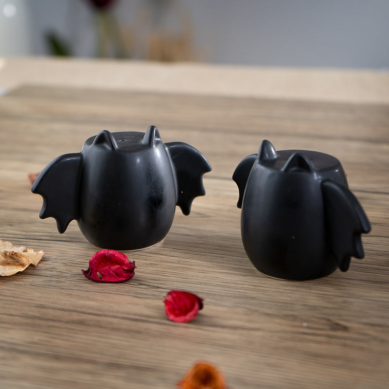 Bat Wing Ceramic Salt and Pepper Shakers Halloween Decorative Tabletop Accent with Fun Bat Design Perfect for Adding Flavor and Style to Your Kitchen or Dining Room 2.36" Inches