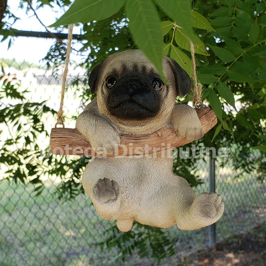 Adorable Pug Pup Hanging on a Branch Swing Playful Puppy Glass Eyes