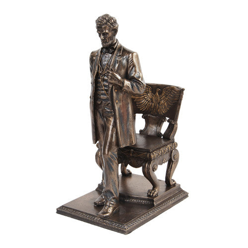 Abraham Lincoln Figurine Standing near Chair with Eagle