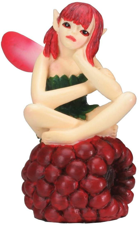 Fairy Sitting on Raspberry Figurine